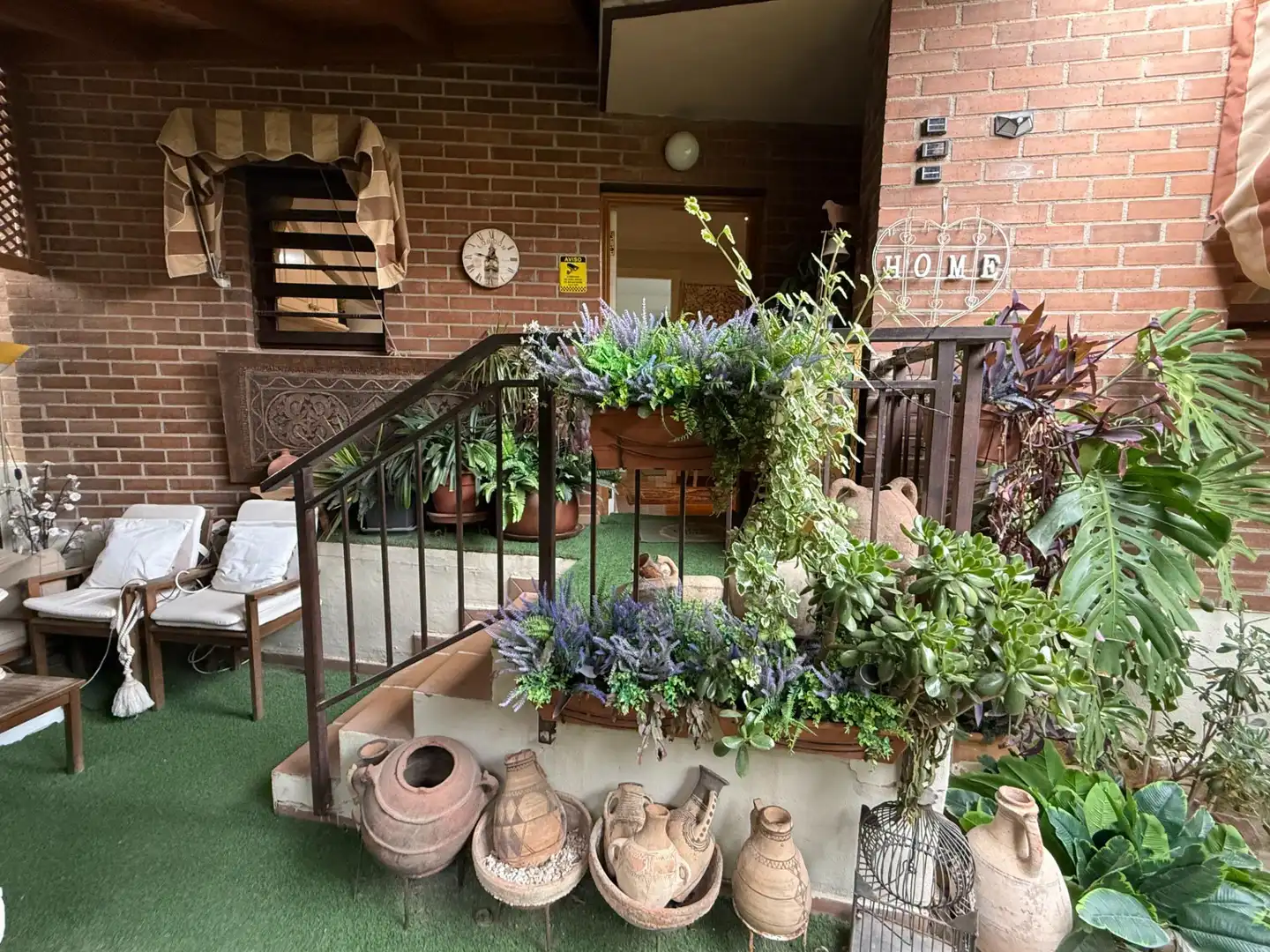 Terrasse von Einfamilien-Reihenhaus zum Verkauf in Sant Joan d'Alacant mit Privatgarten und Gemeinschaftspool