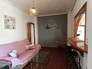 Sala d'estar de Pis de lloguer en Valencia amb Aire condicionat i Moblat