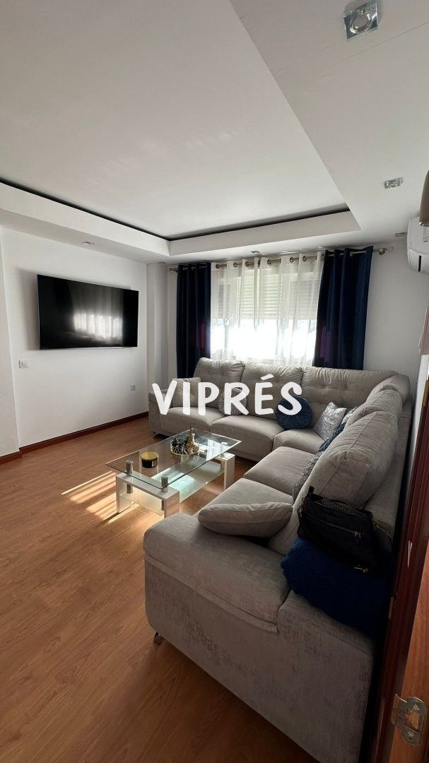 Sala d'estar de Casa adosada en venda en Mérida amb Aire condicionat