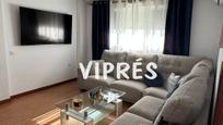 Sala d'estar de Casa adosada en venda en Mérida amb Aire condicionat