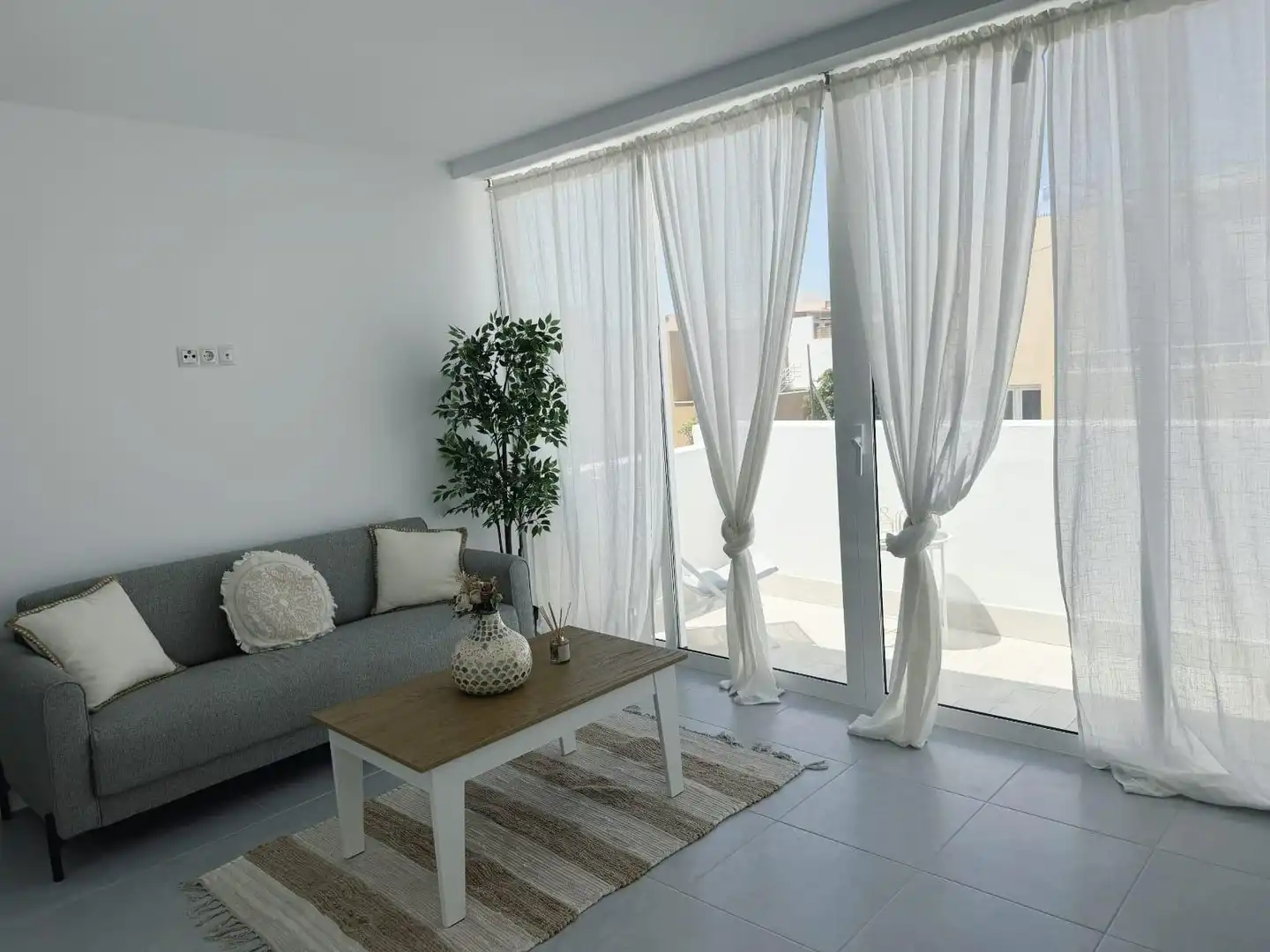 Wohnzimmer von Dachboden zur Miete in Burrero