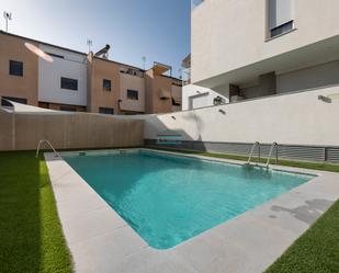 Swimming pool of Flat for sale in Armilla  with Air Conditioner, Terrace and Balcony