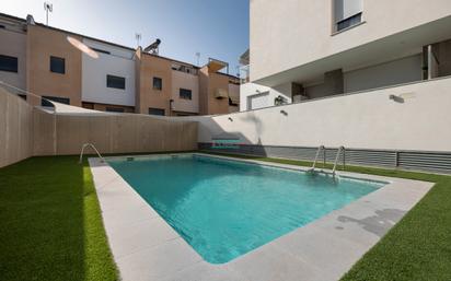 Swimming pool of Flat for sale in Armilla  with Air Conditioner, Terrace and Balcony