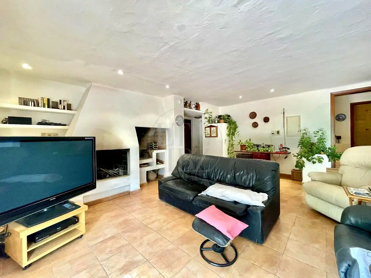 Sala d'estar de Casa o xalet en venda en Sant Joan de Labritja amb Aire condicionat, Jardí privat i Piscina