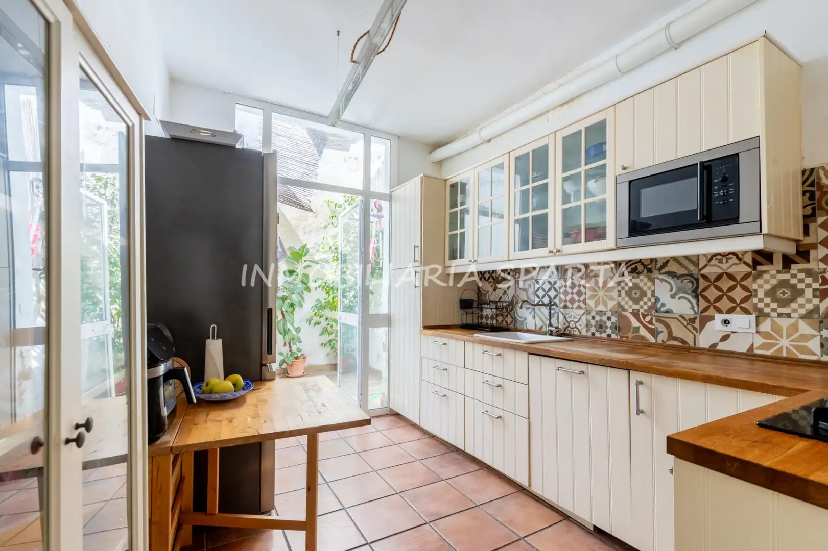 Cocina de Casa adosada en venta en Gelves con Terraza, Horno y Lavadora