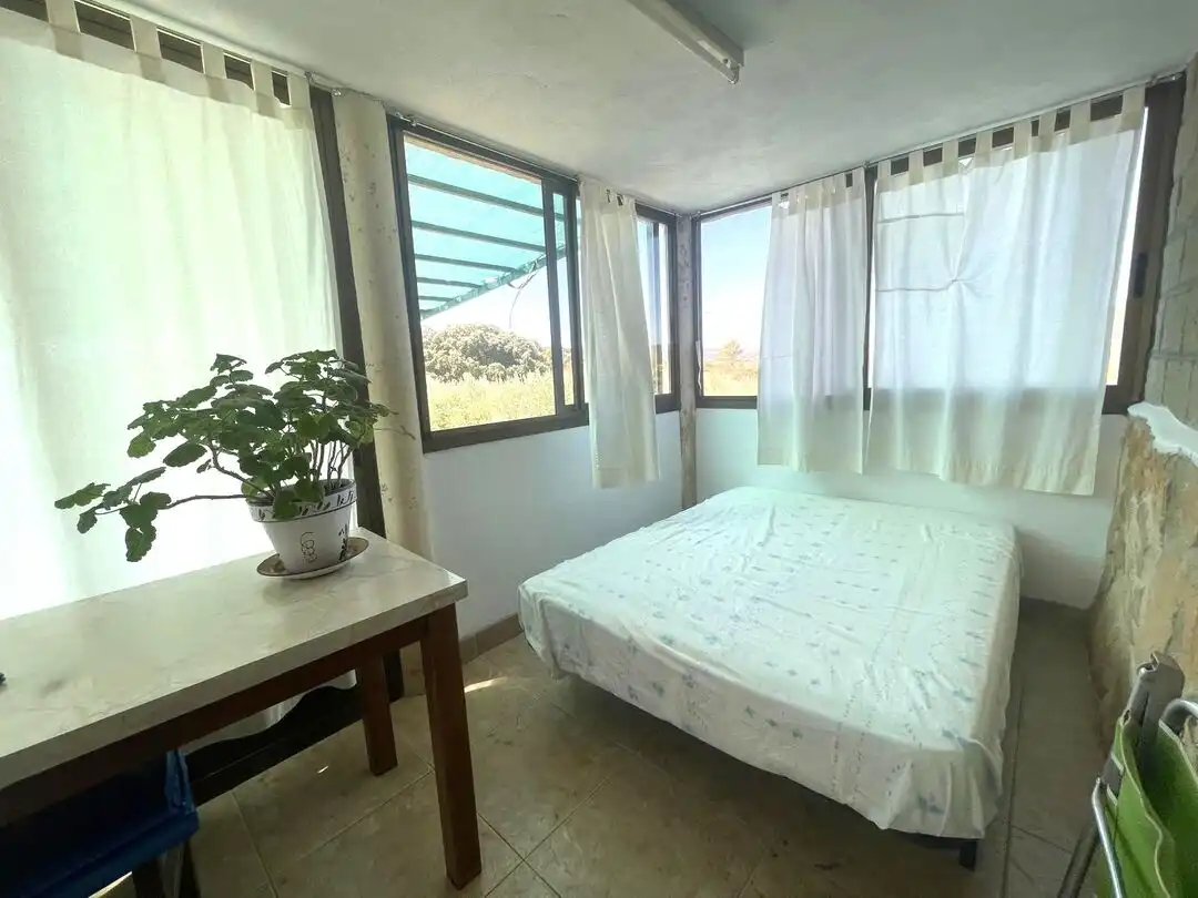 Habitación de Terreno en venta en Pueyo / Puiu