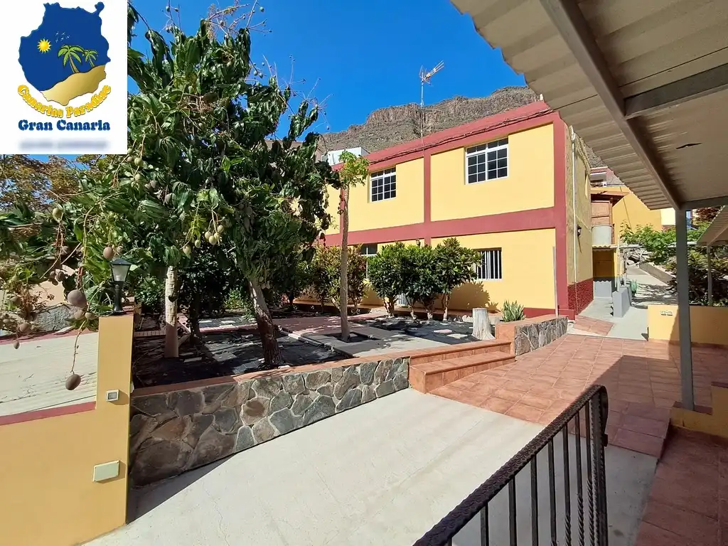 Außenansicht von Wohnung zum Verkauf in Mogán mit Privatgarten und Terrasse