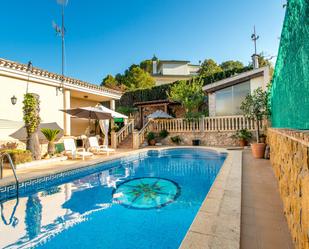 Swimming pool of House or chalet for sale in  Murcia Capital  with Air Conditioner, Heating and Private garden