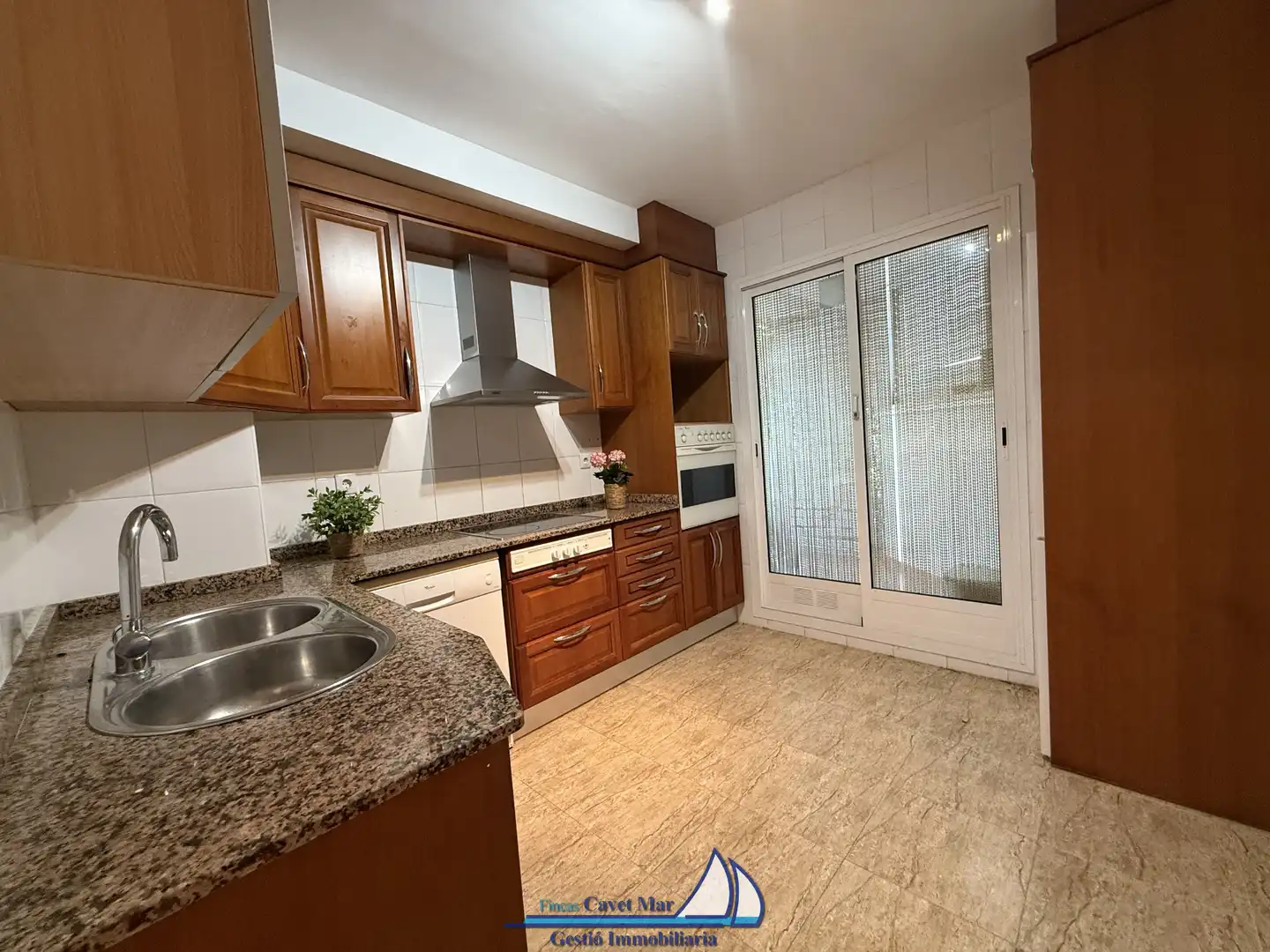Cuina de Apartament en venda en Cambrils amb Aire condicionat, Calefacció i Jardí privat