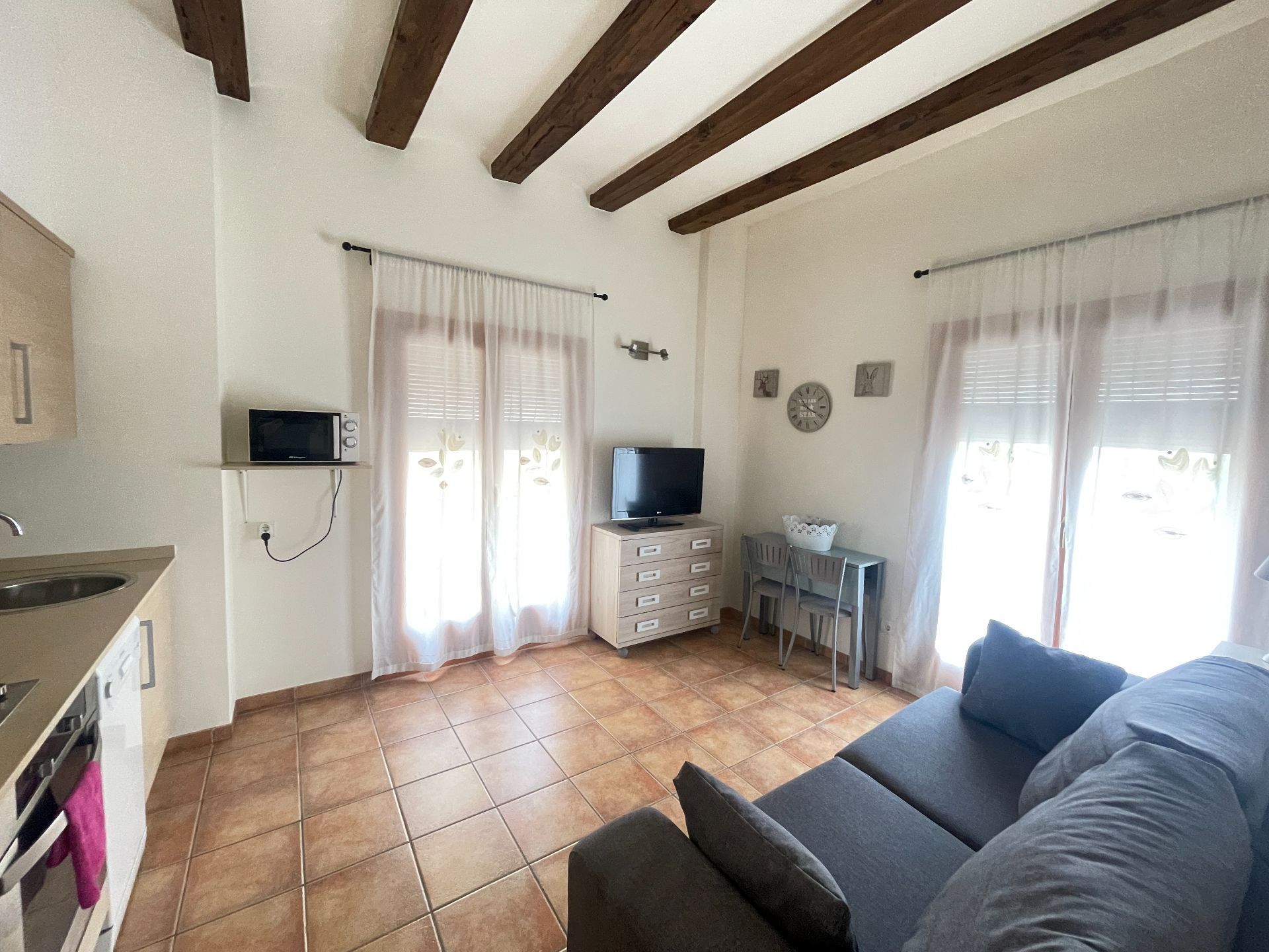 Living room of Flat for sale in Tivenys  with Air Conditioner, Terrace and Furnished