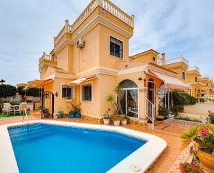 Swimming pool of Single-family semi-detached for sale in Algorfa  with Air Conditioner, Private garden and Terrace
