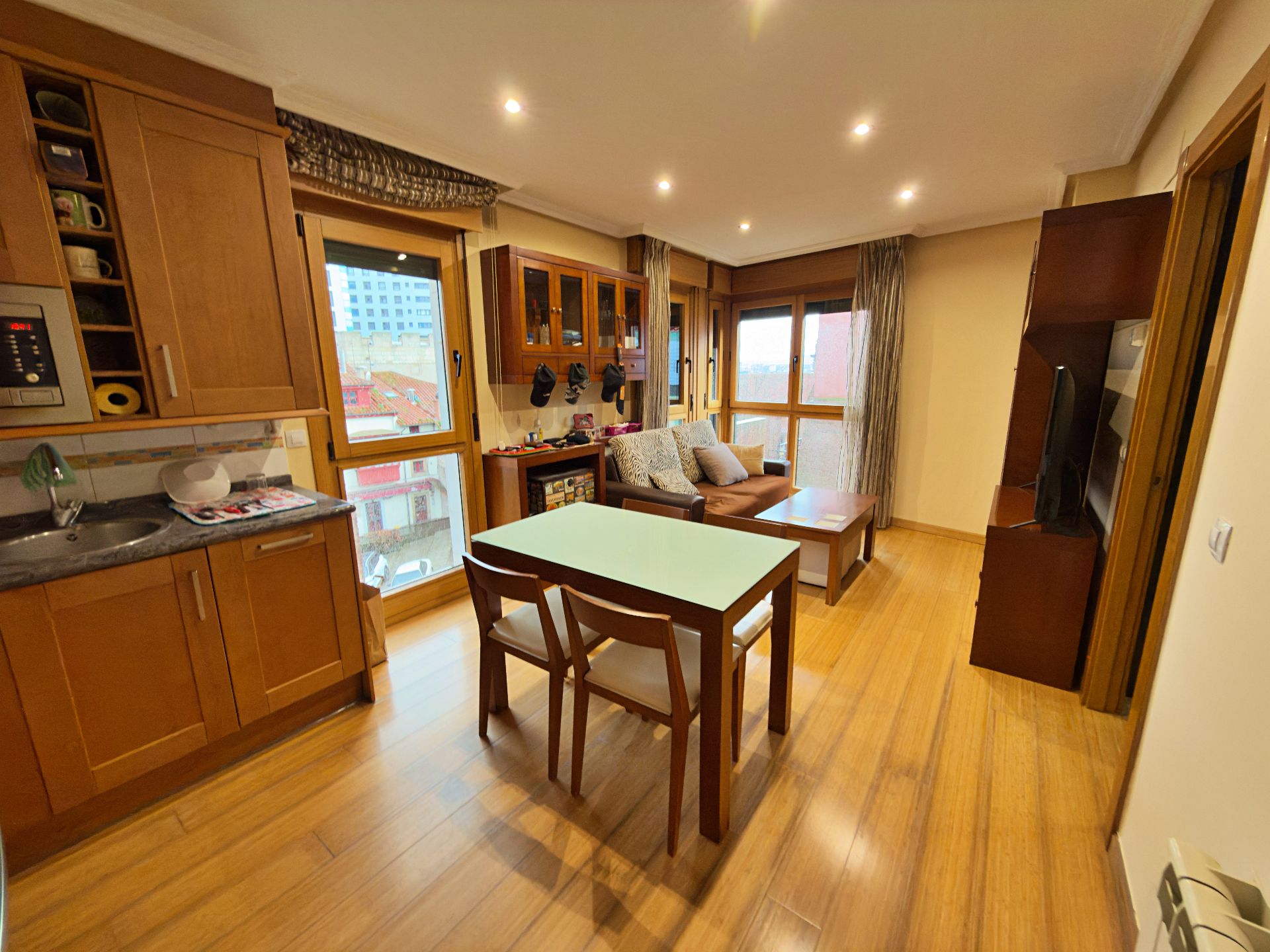 Living room of Apartment for sale in Gijón   with Heating, Parquet flooring and Oven