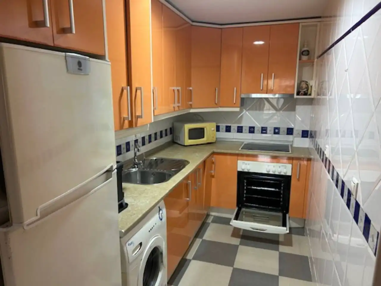 Kitchen of Attic for sale in Roquetas de Mar  with Air Conditioner, Terrace and Furnished