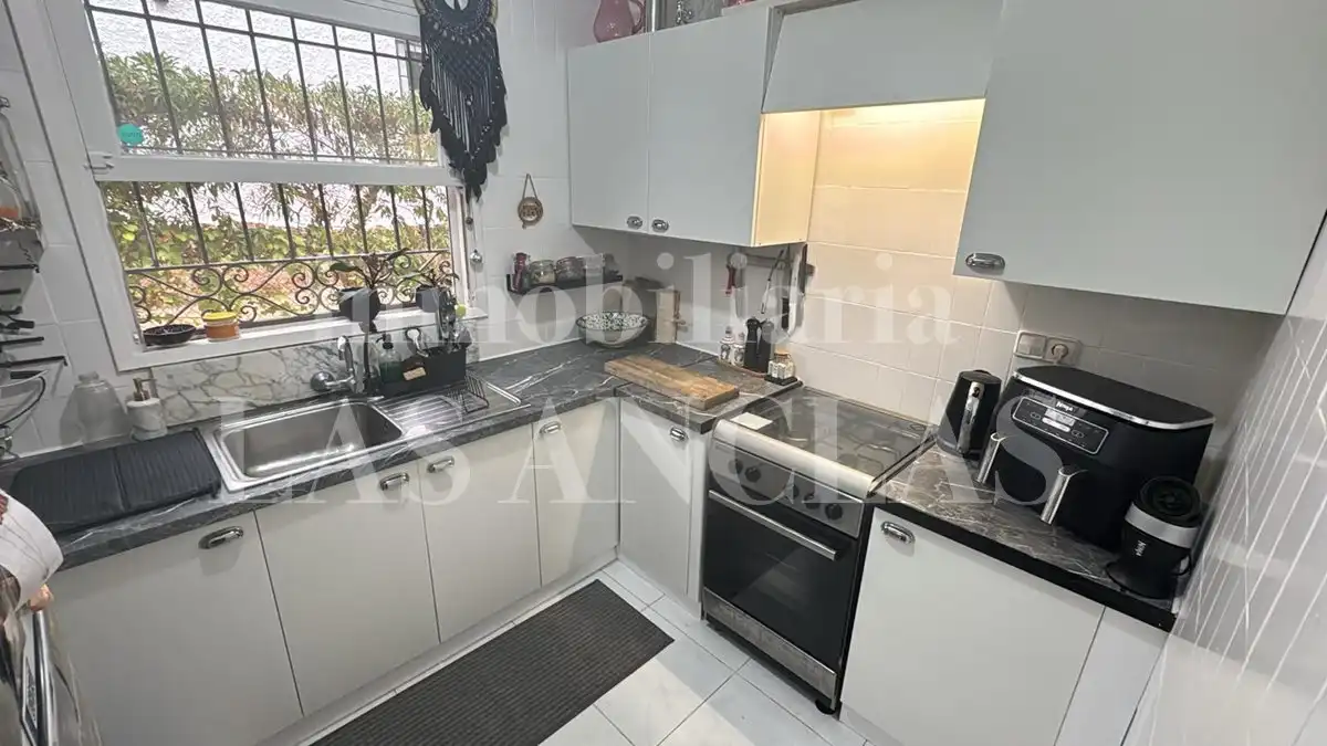 Cocina de Casa adosada en venta en Santa Eulària des Riu con Aire acondicionado, Jardín privado y Terraza