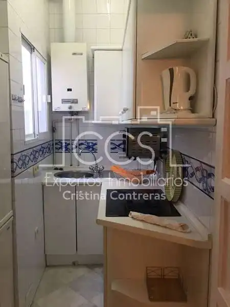 Cuina de Casa adosada en venda en Sevilla amb Aire condicionat