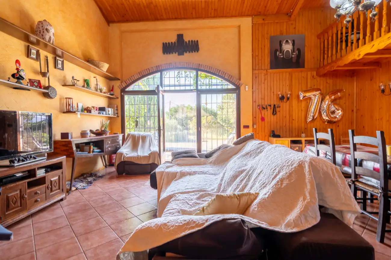 Sala d'estar de Finca rústica en venda en L'Aldea amb Jardí privat, Terrassa i Moblat