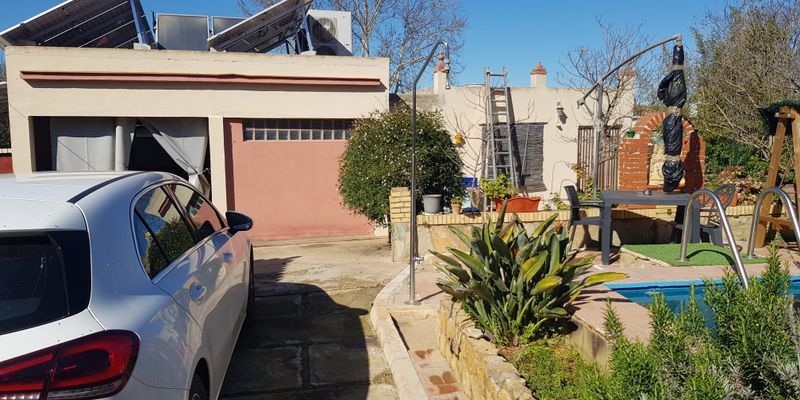 Jardí de Casa o xalet en venda en Carmona amb Jardí privat, Traster i Moblat