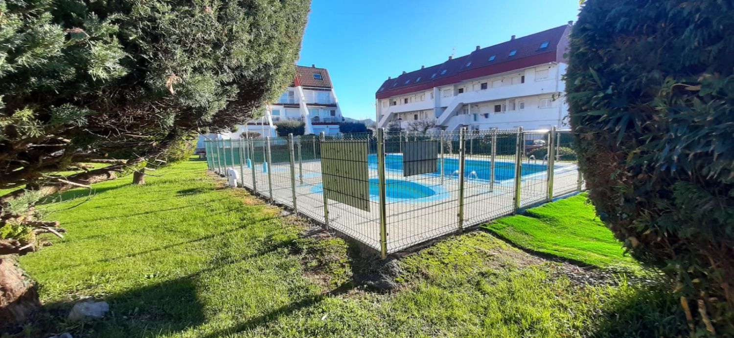 Swimming pool of Duplex for sale in Argoños   with Heating and Terrace
