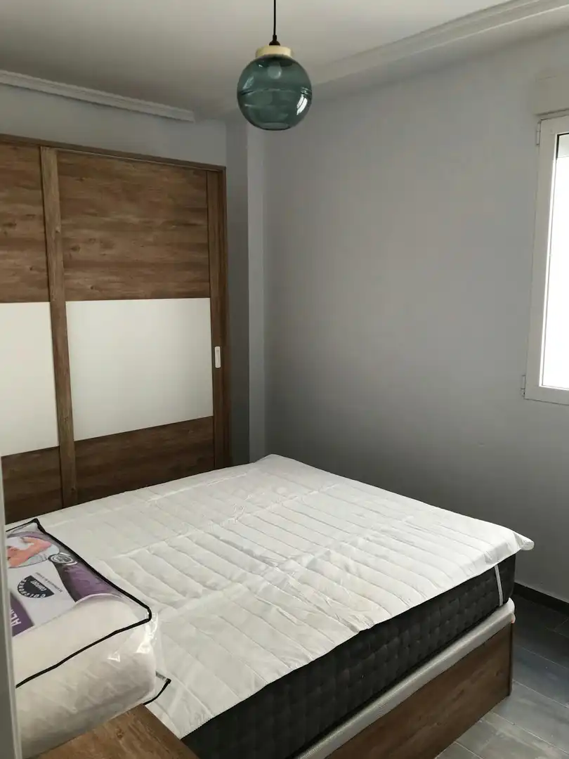 Dormitori de Pis per a compartir en  Valencia Capital amb Aire condicionat, Moblat i Rentadora