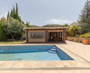 Swimming pool of House or chalet for sale in Dílar  with Air Conditioner, Heating and Private garden