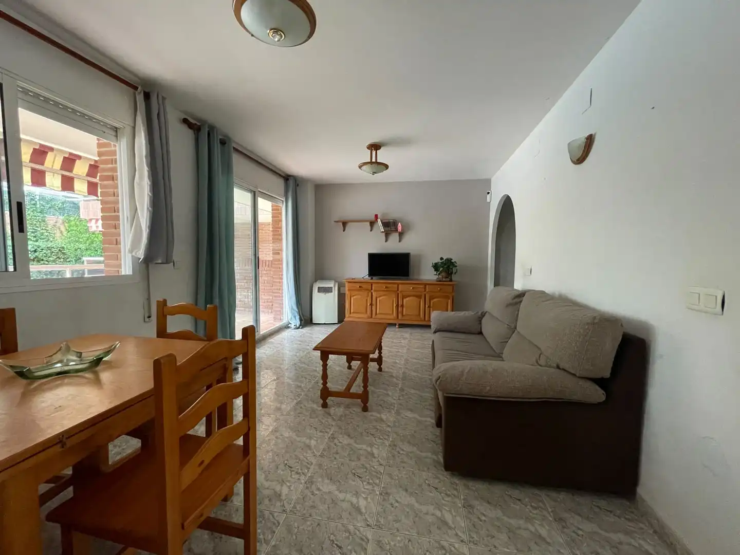 Sala d'estar de Planta baixa en venda en Salou amb Jardí privat, Terrassa i Moblat
