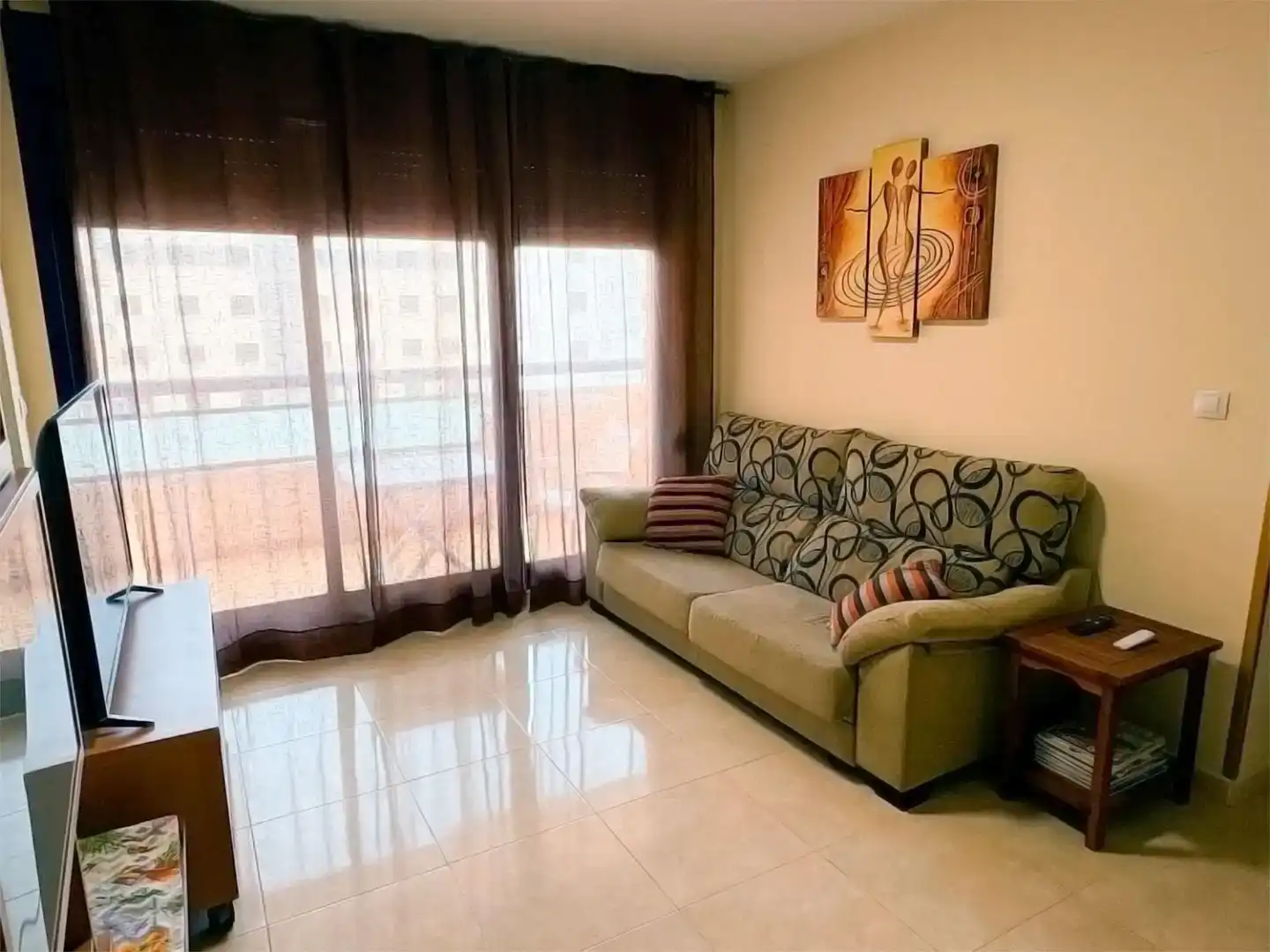 Sala de estar de Apartamento de alquiler en Bellreguard con Aire acondicionado, Jardín privado y Piscina
