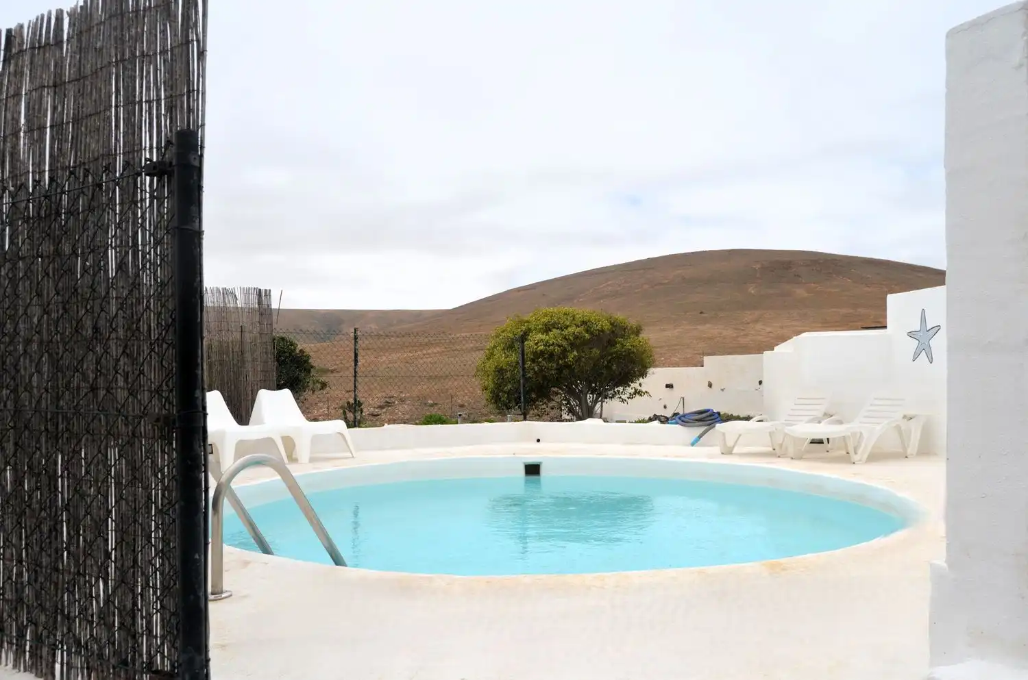 Piscina de Casa o xalet en venda en La Oliva amb Aire condicionat, Jardí privat i Terrassa