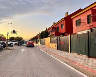 Exterior view of Single-family semi-detached for sale in Alcalá de Guadaira  with Air Conditioner, Heating and Private garden