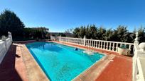 Swimming pool of House or chalet for sale in Fuentenovilla  with Air Conditioner, Heating and Terrace