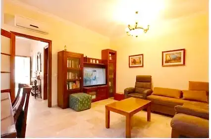 Sala de estar de Casa adosada en venta en Mairena del Alcor