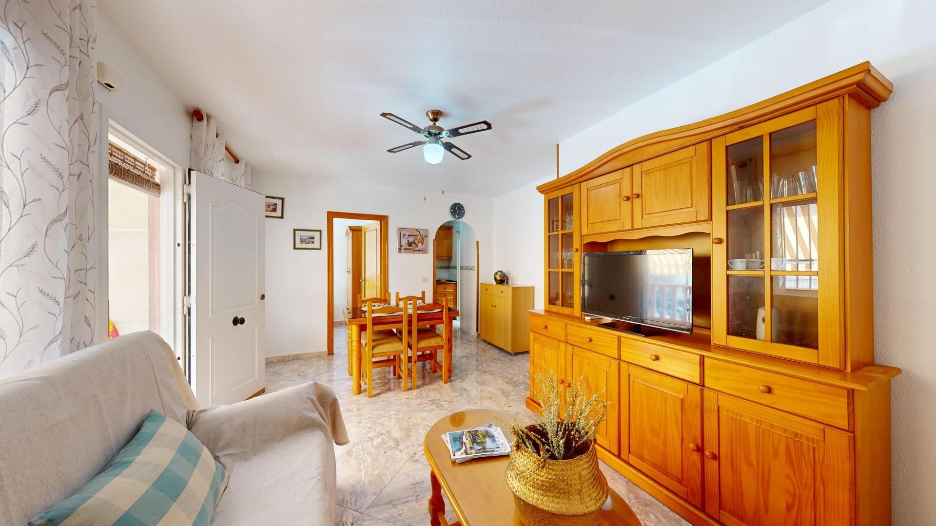 Living room of Planta baja for sale in Guardamar del Segura  with Air Conditioner, Terrace and Community pool