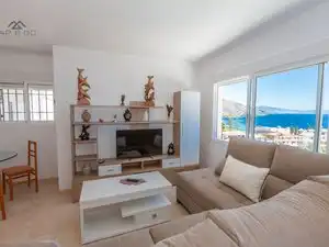Sala d'estar de Casa o xalet de lloguer en Almuñécar amb Aire condicionat, Jardí privat i Terrassa