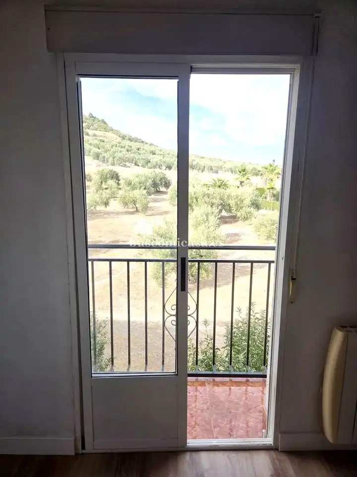 Dormitori de Casa adosada en venda en Jaén amb Aire condicionat, Terrassa i Piscina