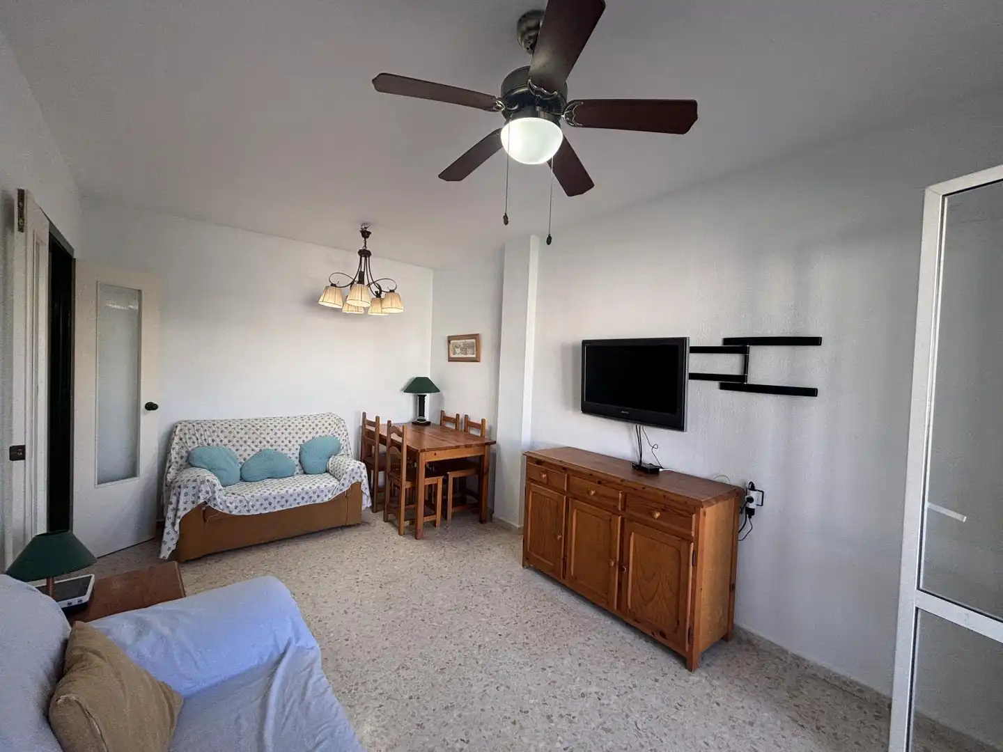Sala de estar de Piso de alquiler en El Portil con Jardín privado, Terraza y Piscina