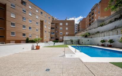 Swimming pool of Attic for sale in  Granada Capital  with Air Conditioner, Heating and Private garden