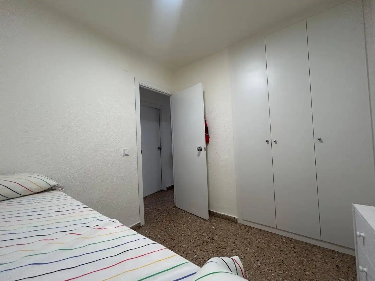 Dormitori de Apartament de lloguer en La Pobla de Farnals amb Moblat i Piscina comunitària