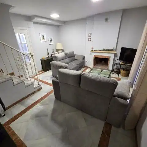 Sala d'estar de Casa adosada de lloguer en Islantilla amb Terrassa