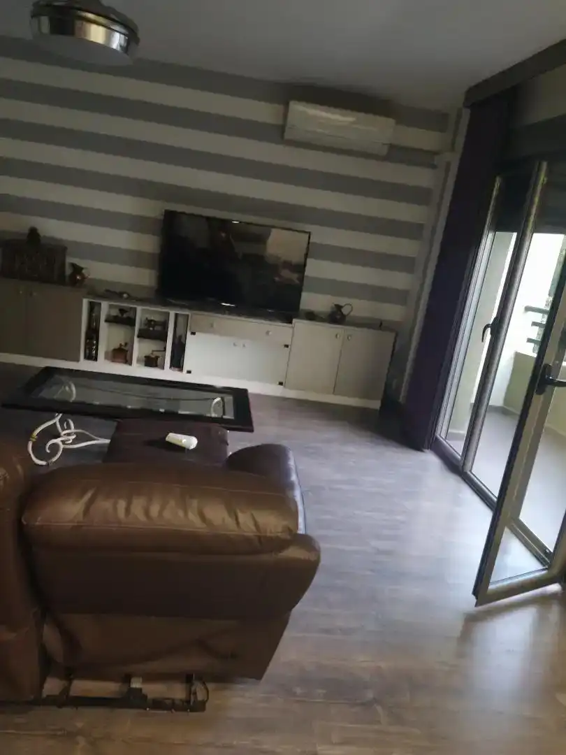 Sala d'estar de Pis de lloguer en Baza amb Aire condicionat, Parquet i Moblat