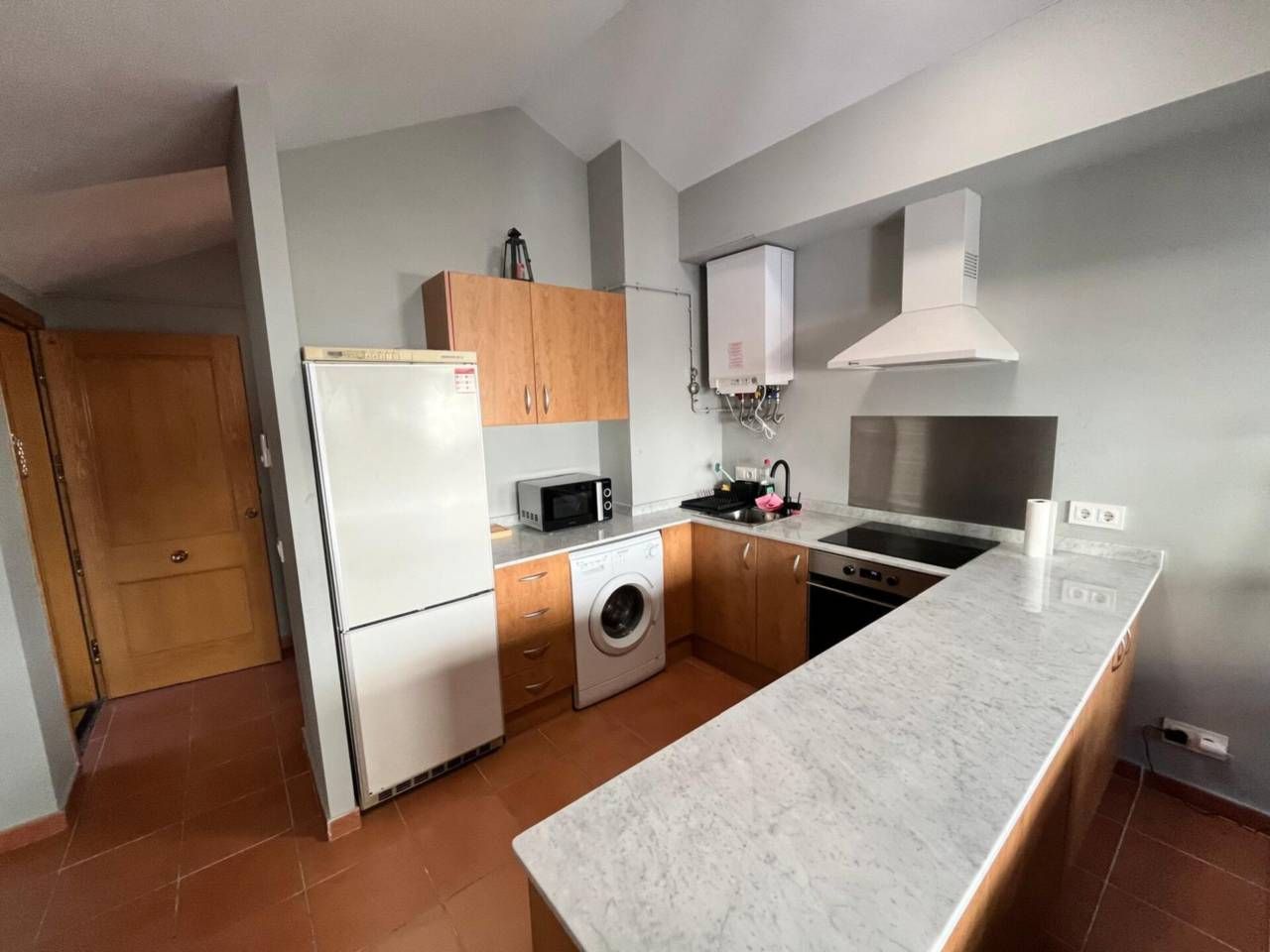 Cuina de Àtic de lloguer en Montellà i Martinet amb Calefacció, Parquet i Moblat