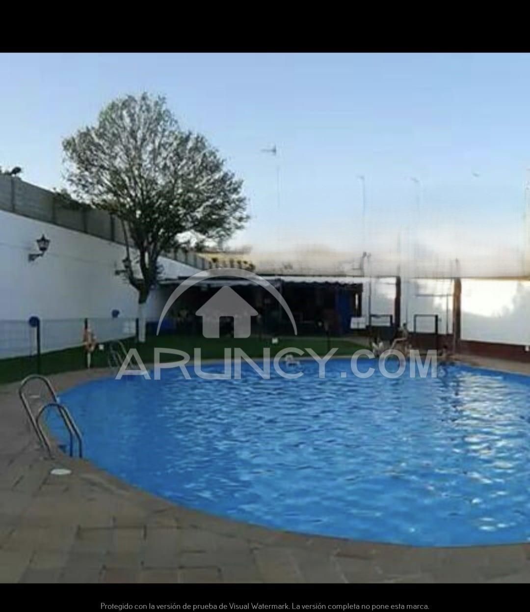 Swimming pool of Single-family semi-detached for sale in Alcalá de Guadaira  with Air Conditioner, Heating and Parquet flooring