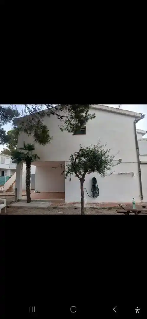 Vista exterior de Casa adosada en venda en L'Ametlla de Mar  amb Aire condicionat, Jardí privat i Parquet