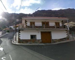 Vista exterior de Casa o xalet en venda en Mogán amb Jardí privat i Forn
