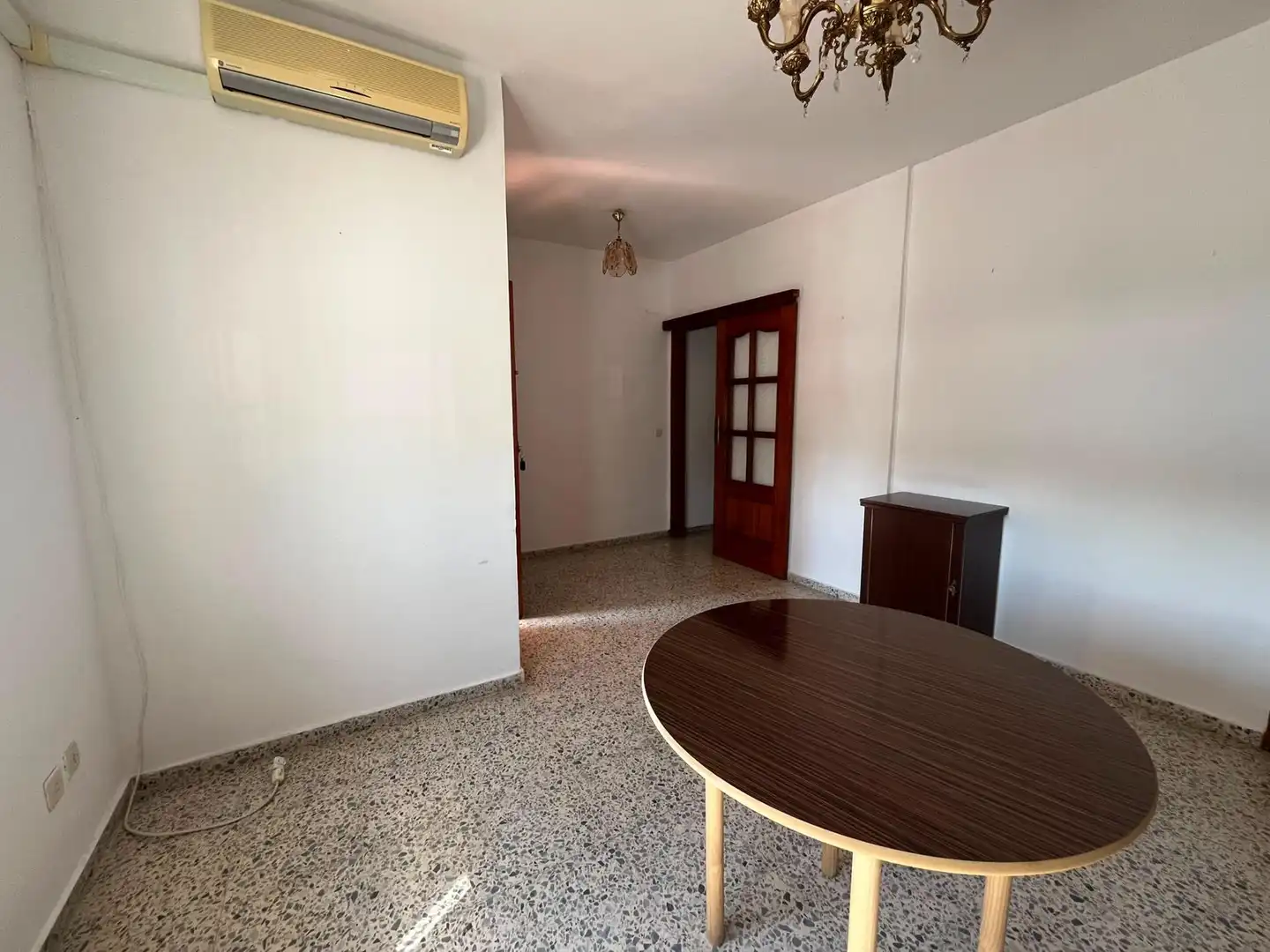 Sala de estar de Casa adosada en venta en Aznalcázar con Aire acondicionado