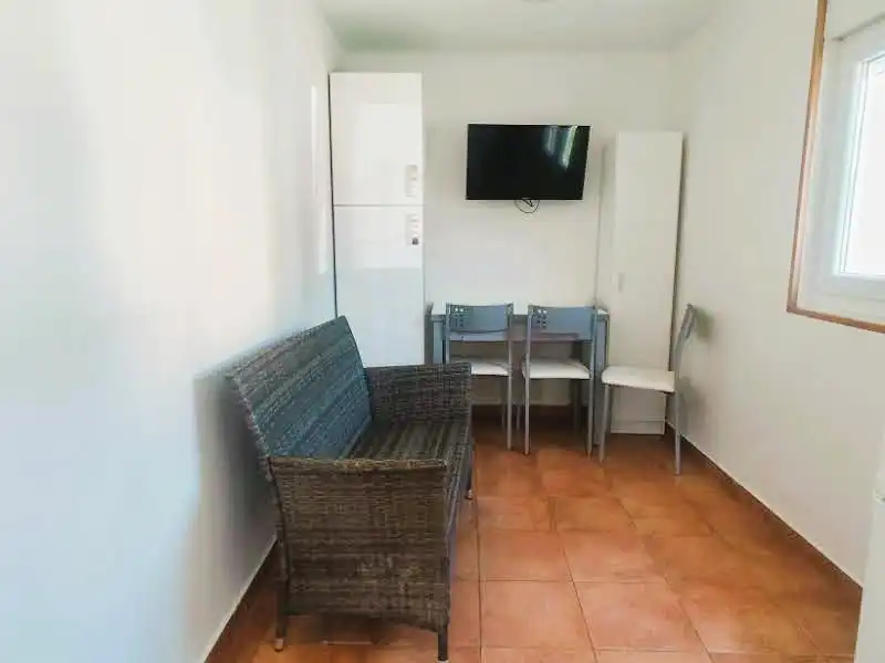 Sala d'estar de Casa o xalet en venda en Pravia amb Calefacció, Moblat i Forn