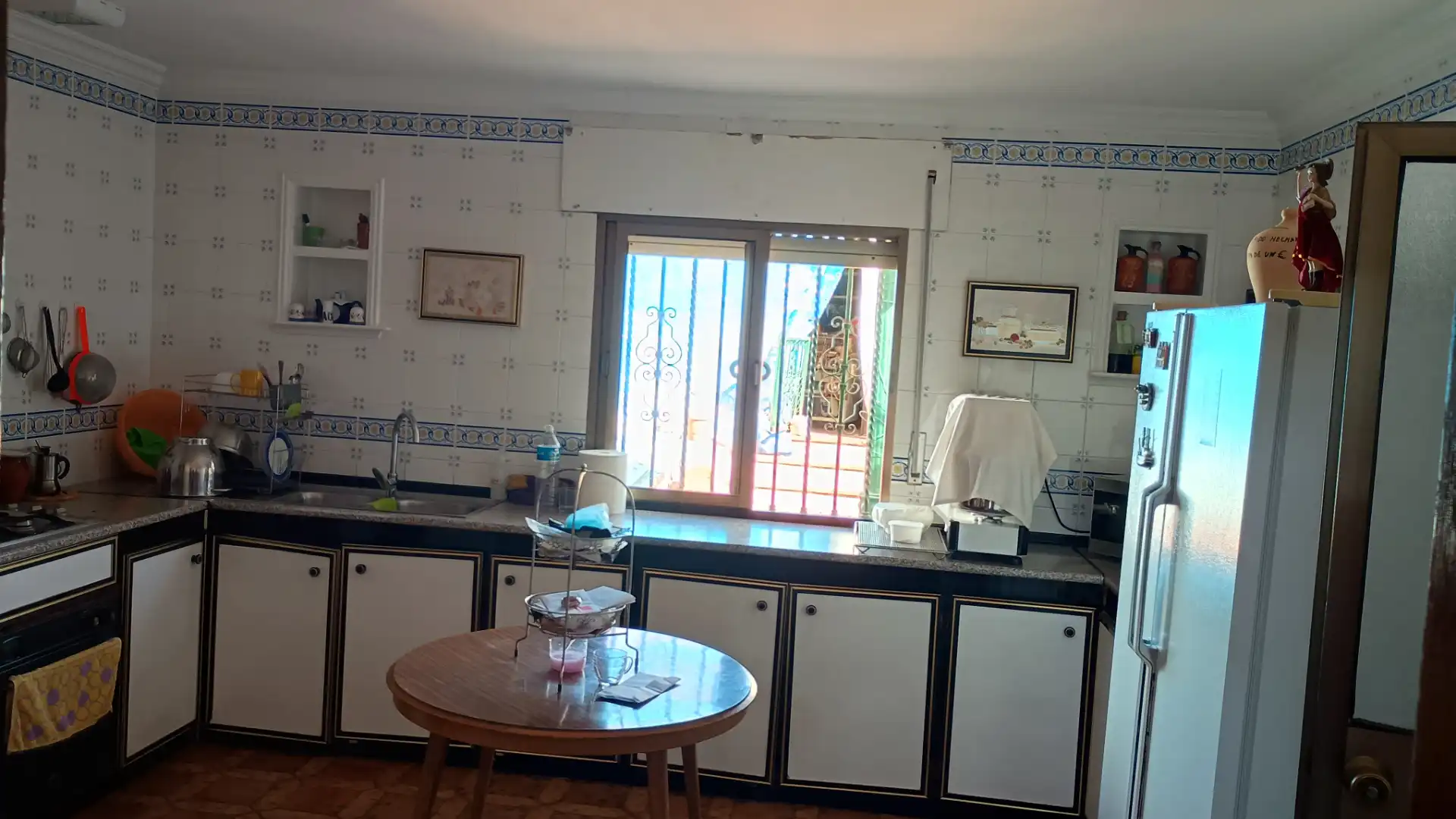 Cocina de Casa adosada en venta en Villanueva del Ariscal con Aire acondicionado, Piscina y Horno