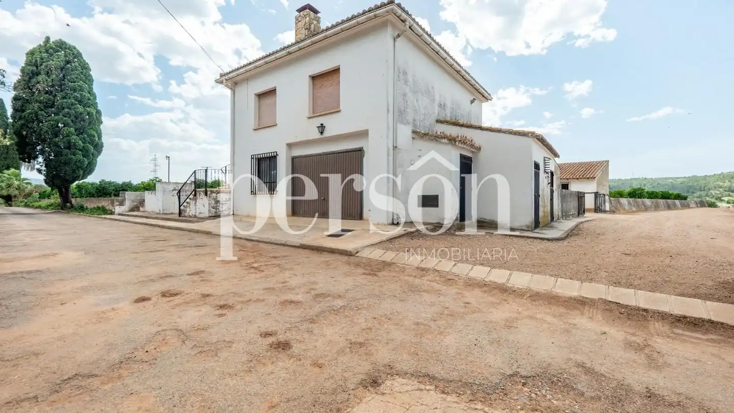Vista exterior de Finca rústica en venda en Canals amb Aire condicionat, Calefacció i Jardí privat