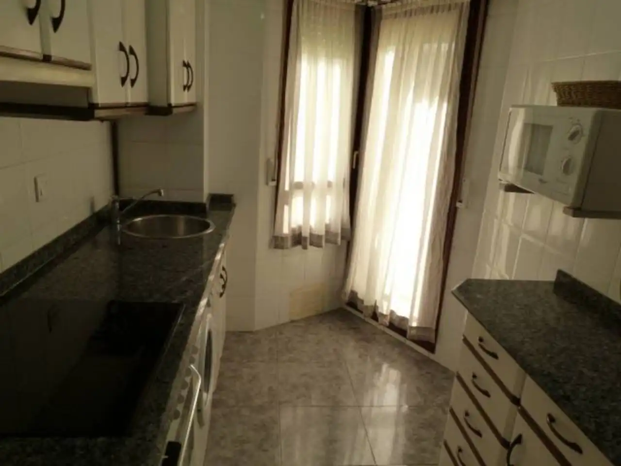 Cocina de Apartamento de alquiler en Noja con Calefacción, Amueblado y Piscina comunitaria