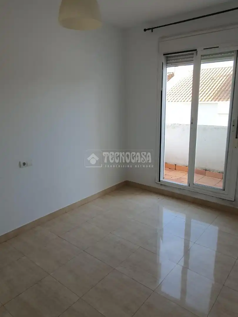 Habitación de Casa adosada en venta en Palomares del Río con Aire acondicionado