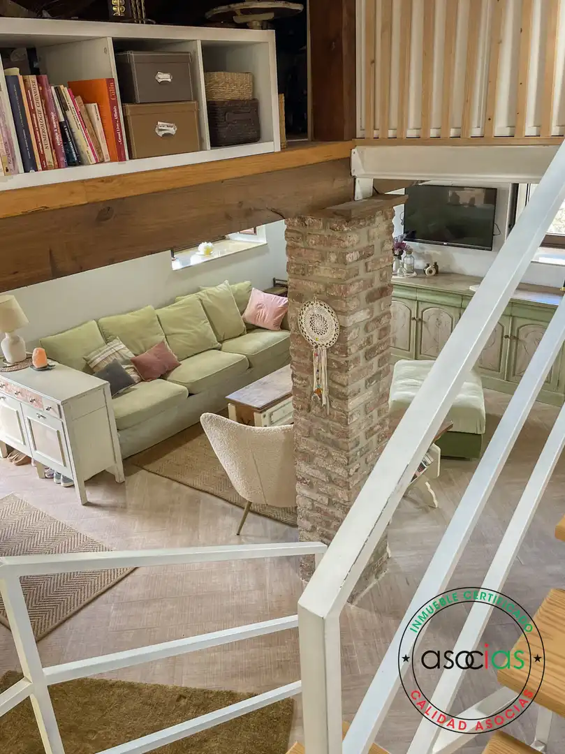 Sala d'estar de Casa adosada en venda en Villaviciosa amb Calefacció i Jardí privat