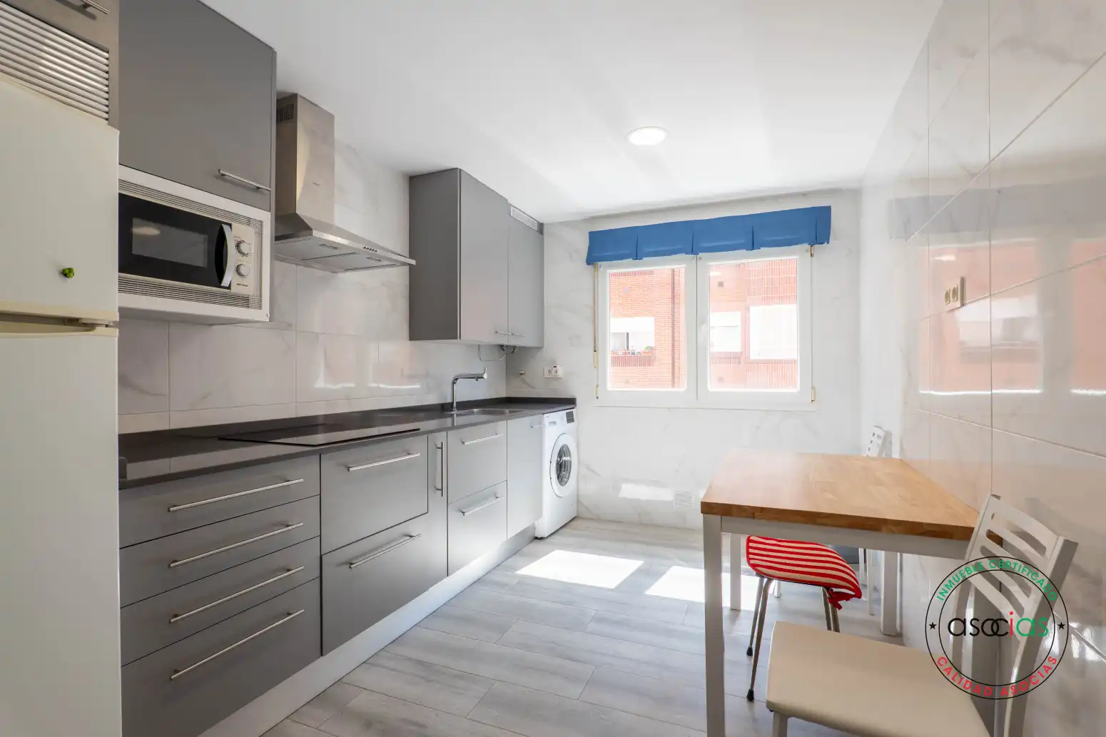 Kitchen of Flat for sale in Gijón   with Heating and Parquet flooring